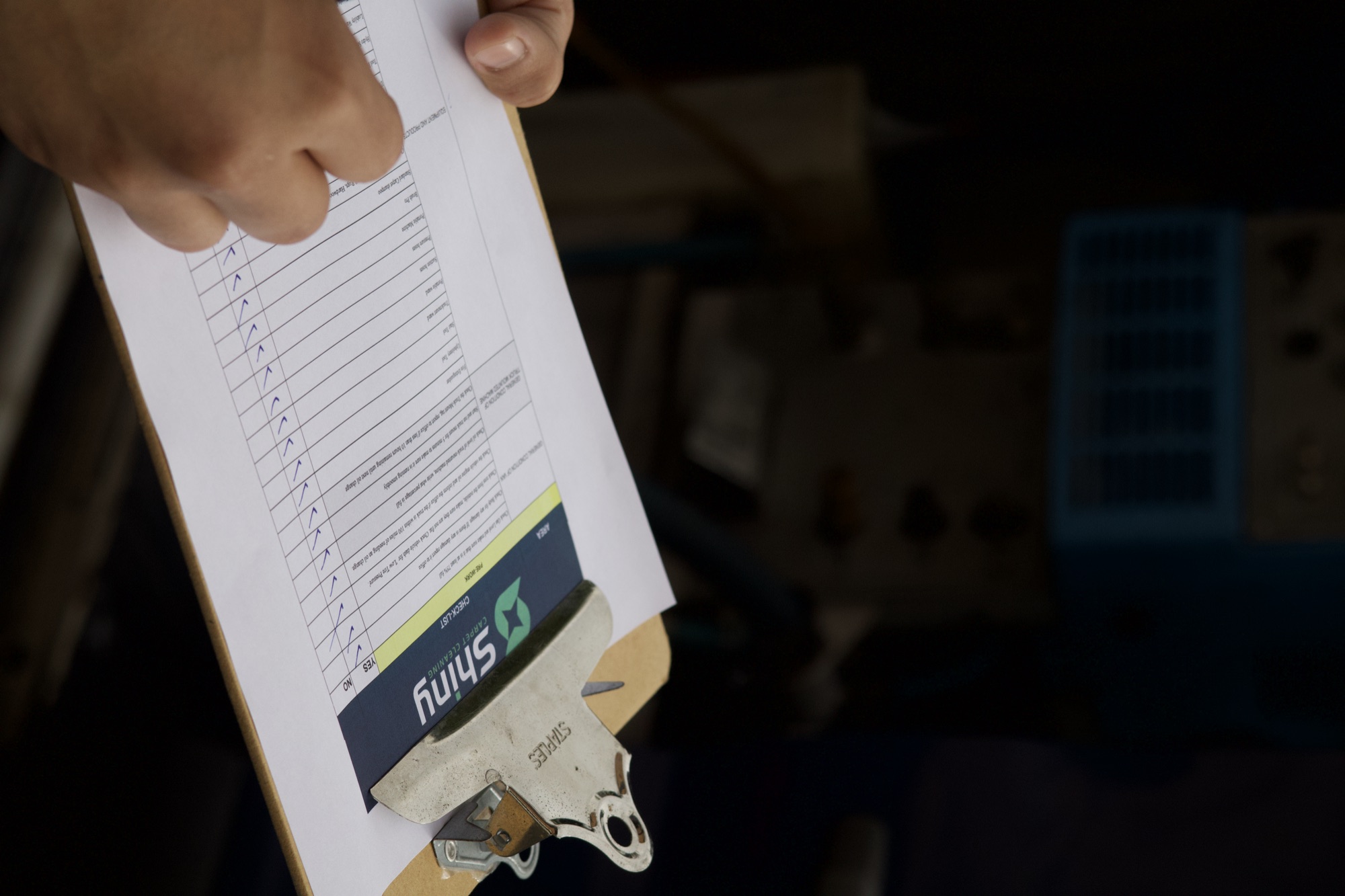 Shiny Carpet Cleaning checklist on a clipboard